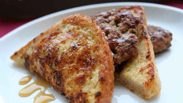 Black Pepper Parmesan Reggiano French Toast with Italian Sausage Patties and Warm Honey
