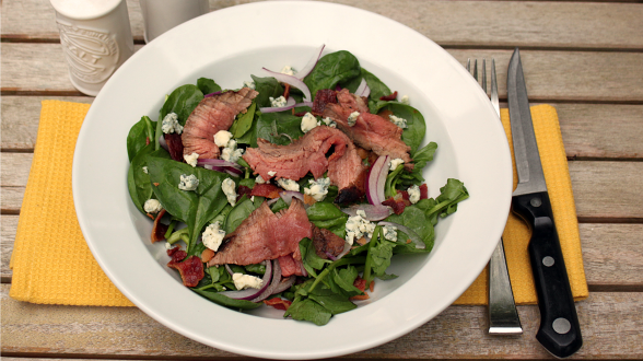Steak and Spinach Salad with Bacon Bits and Blue Cheese