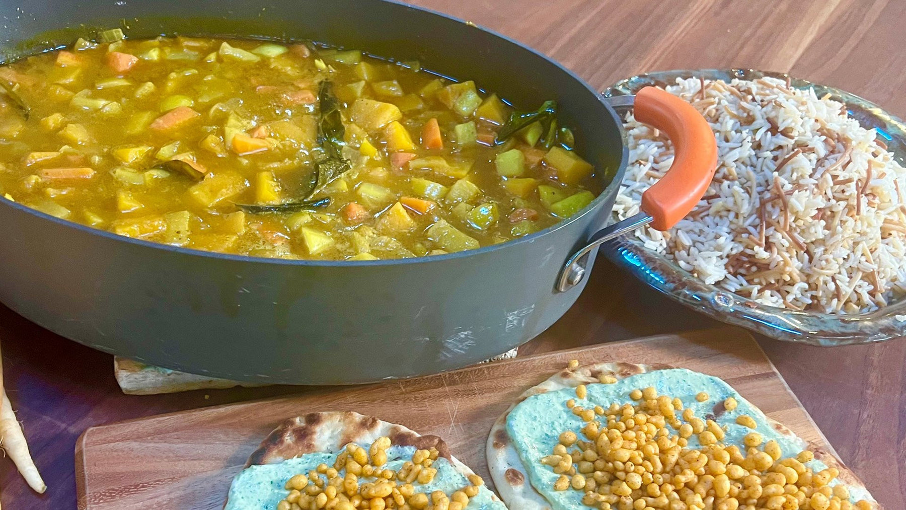 Carrot and Butternut Curry, Smoked Almond Pilaf and Charred Scallion Raita and Naan | Rachael Ray