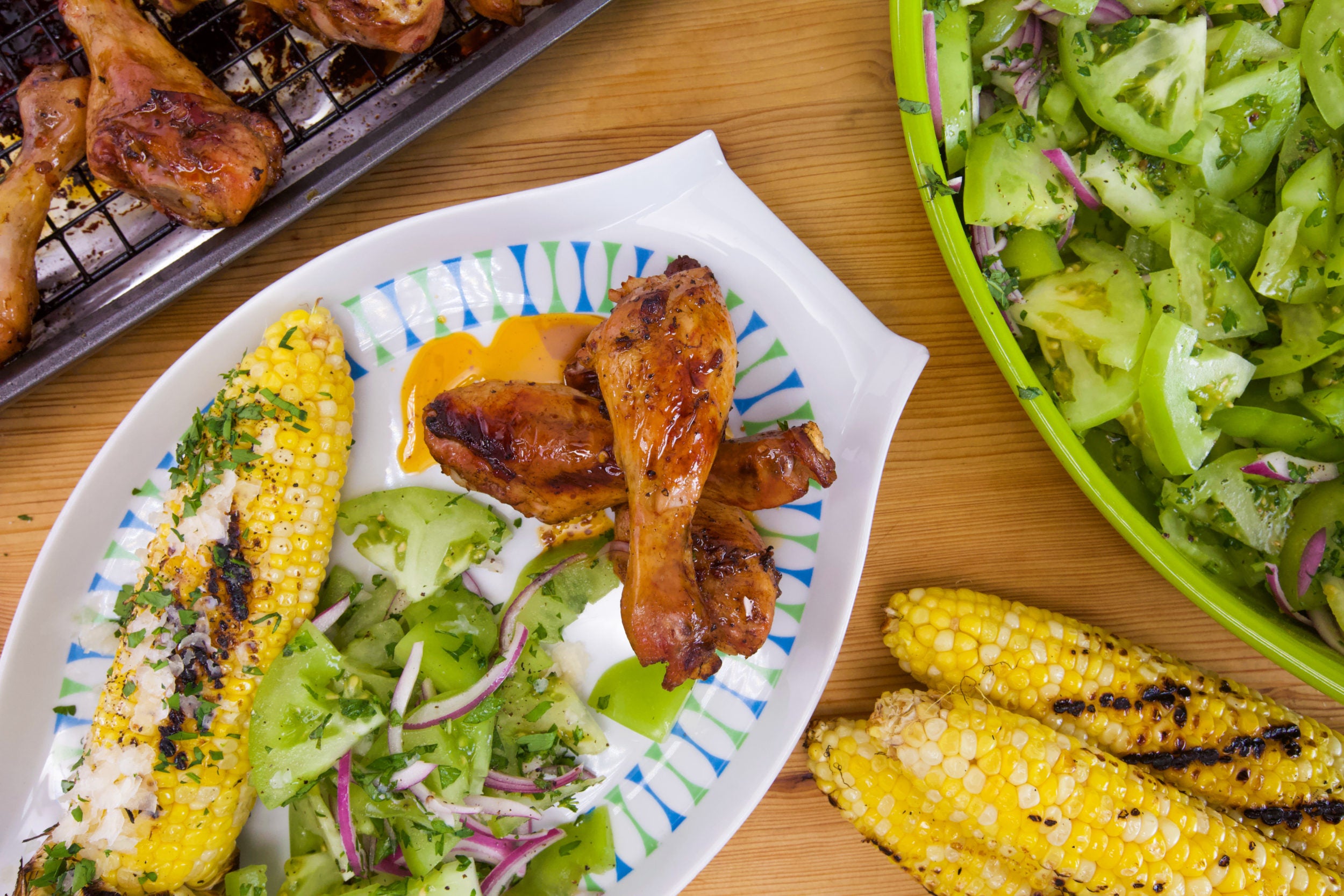 Rachael's Balsamic-Marinated Chicken Legs, Green Tomato Salad and Corn with Garlic Butter