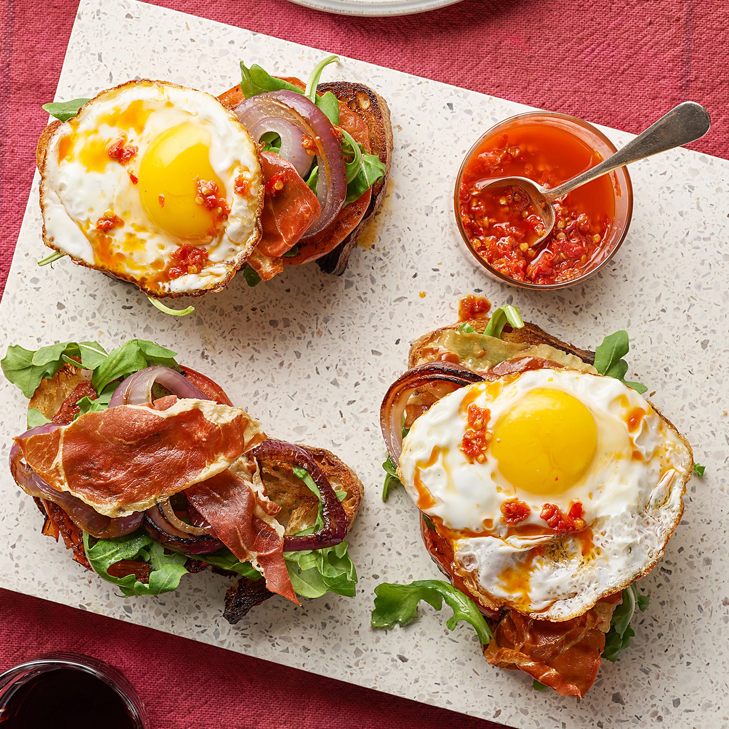 Breakfast Bruschetta: Charred Bread with Grilled Tomatoes, Crispy Prosciutto & Eggs