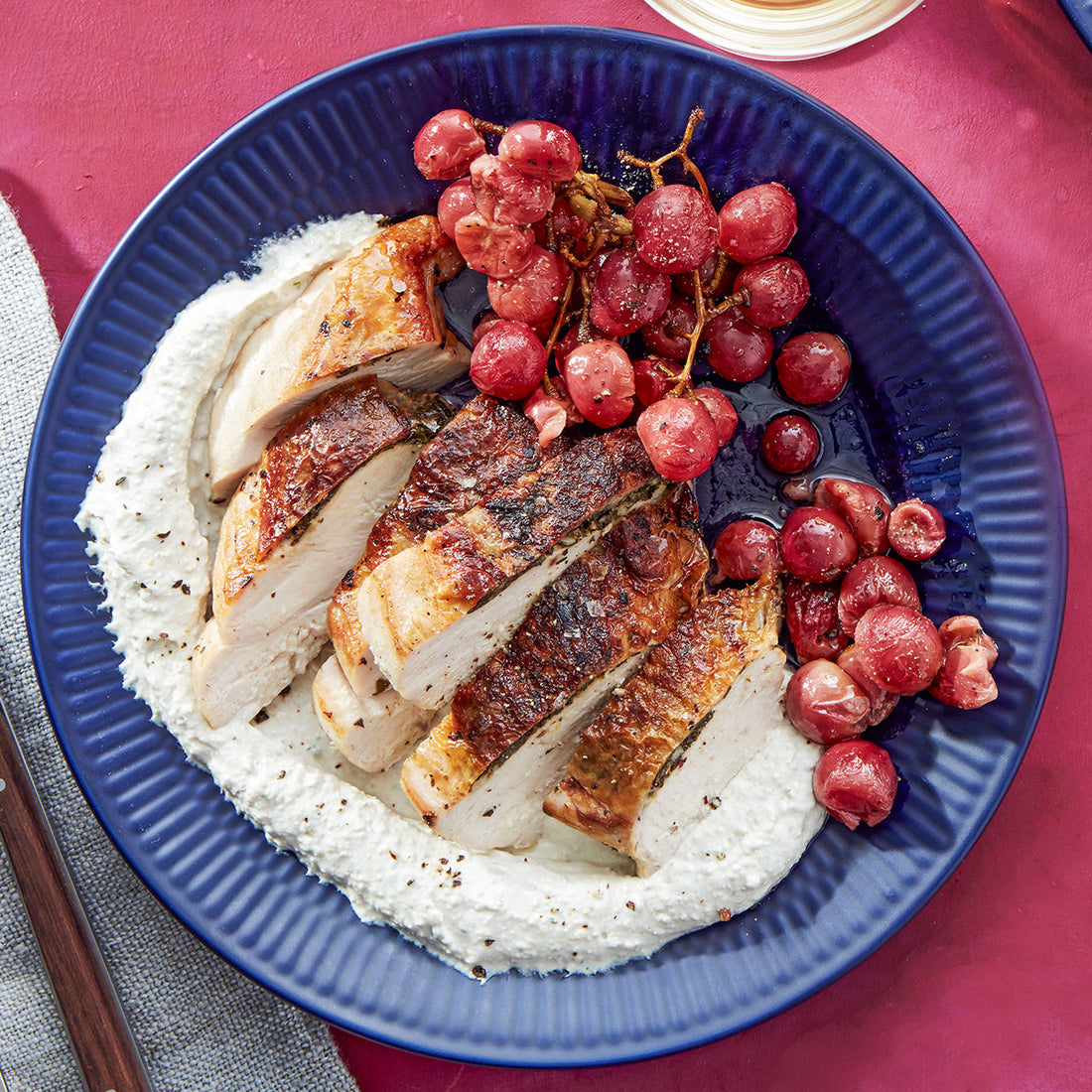 Greek Gremolata Chicken Breasts Under a Brick with Feta & Walnut Sauce & Roasted Grapes