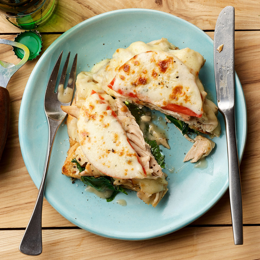 Hot Turkey Sandwich Upgrade: Garlic Toasts with Wilted Spinach, Turkey, Gravy, Tomato & Provolone
