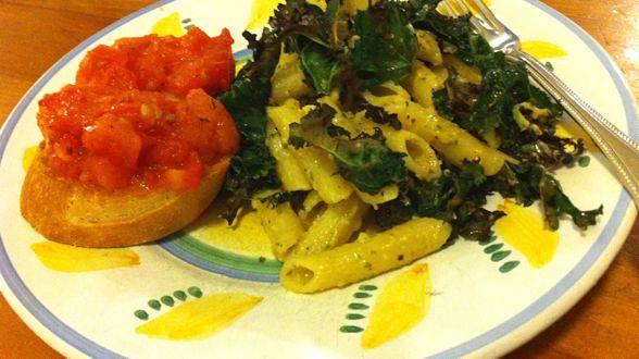 Tuscan Pesto-Dressed Penne with Crispy Kale with Garlic and Broiled Tomato Crostini