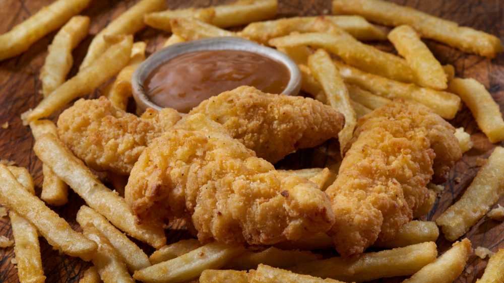 Rachael Ray's Sweet and Tangy BBQ gravy served with chicken tenders and fries