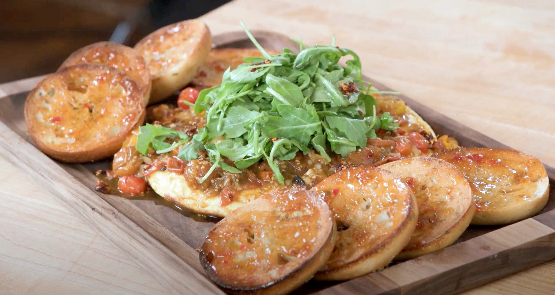 Rachael Ray's Meals in Minutes Parm Frittata with Arugula and Burst Cherry Tomato Sauce, Glazed Bagels and Pan Roasted Sasauge Recipe