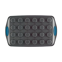 A 24-cup nonstick mini muffin pan with blue silicone handles.