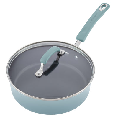 A light blue saucepan with a glass lid and gray handle.