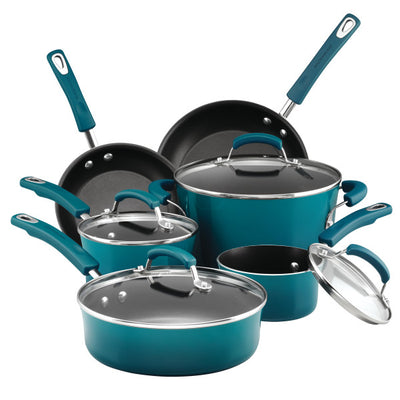 Teal nonstick cookware set with pots, pans, and glass lids.