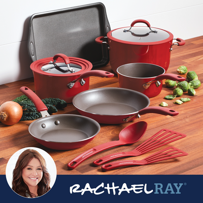 Red cookware set with utensils on a wooden surface, Rachael Ray branding.