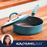 Teal nonstick saucepan with lid on a wooden surface, featuring brand logo.
