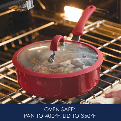 Red pan with lid inside an oven; text describes temperature limits.