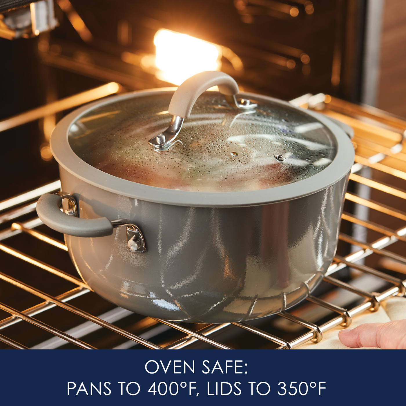 5-Quart Cook + Create Nonstick Dutch Oven with Lid in gray, placed in the oven. Text reads: "Oven safe: Pans up to 400°F, lids up to 350°F." Ideal for stove-to-oven recipes.