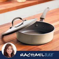 Nonstick saucepan with a glass lid on a wooden countertop; Rachael Ray brand.