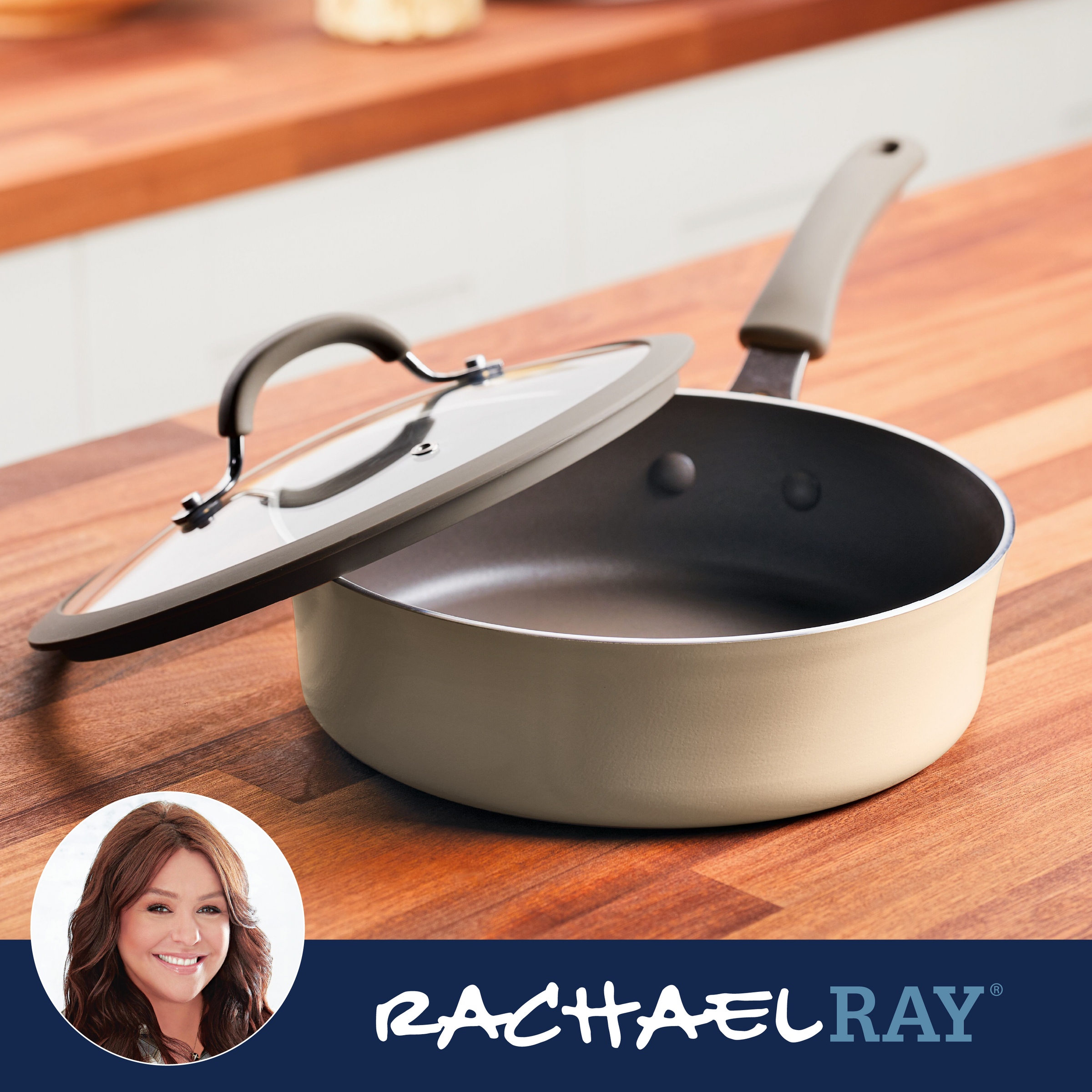 Nonstick saucepan with a glass lid on a wooden countertop; Rachael Ray brand.