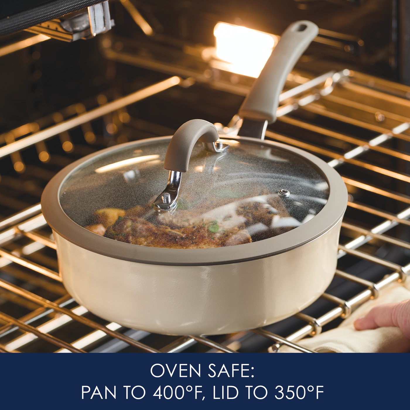 Pan with glass lid in an oven, labeled with heat safety information.