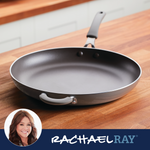 A nonstick frying pan with a handle on a wooden kitchen countertop.