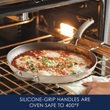 Frying pan with food in oven; silicone-grip handles noted as oven-safe.
