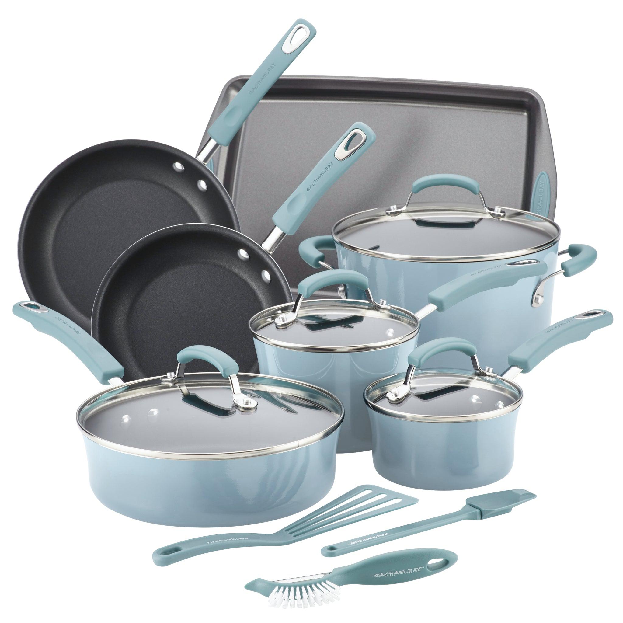 Set of light blue cookware with pans, pots, baking tray, and utensils.