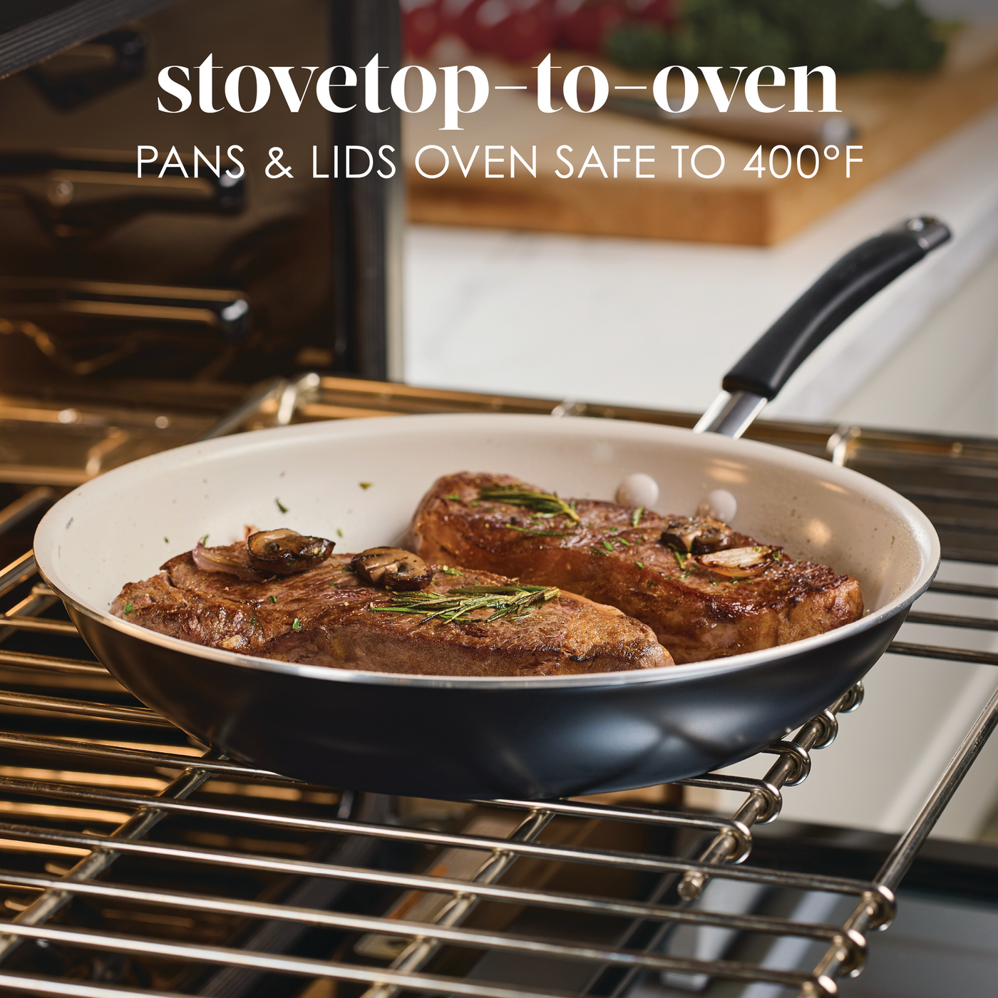 Steak cooking in a pan inside an oven. Oven-safe up to 400°F.