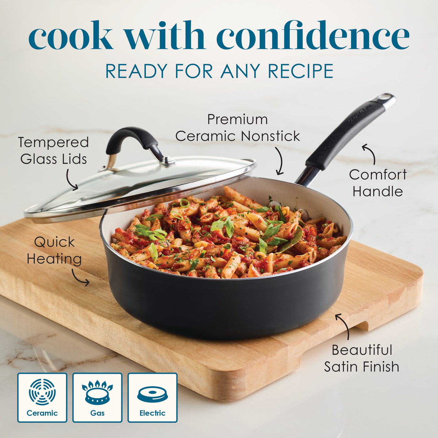 Nonstick skillet with pasta and labeled features on a wooden cutting board.
