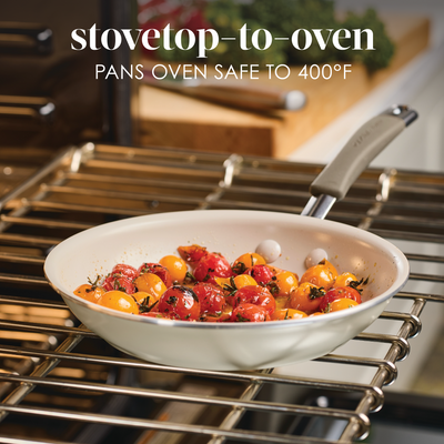 Pan with cherry tomatoes in oven, text about stovetop-to-oven use.