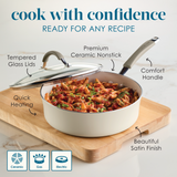 White ceramic pot with pasta, labeled features include glass lid and comfort handle.