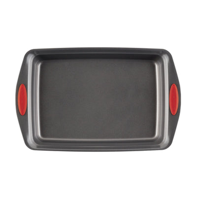 Rectangular baking pan with red silicone grips on the handles.