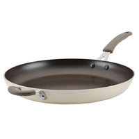 The Cook + Create Nonstick Frying Pan is a high-performance gray pan crafted with thicker gauge aluminum and features dual handles for easy maneuverability.