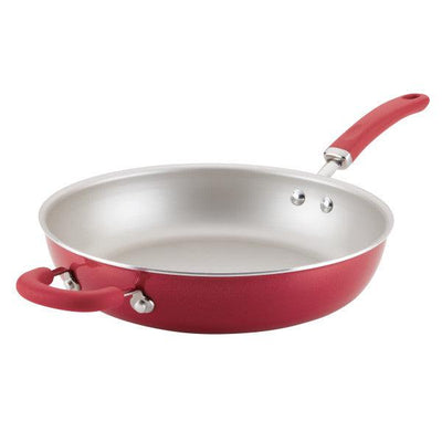 Red frying pan with an additional helper handle.