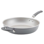 A nonstick frying pan with a long handle and an additional helper handle.