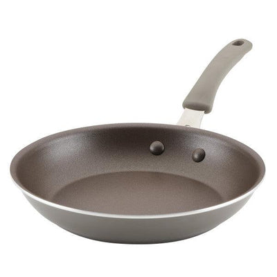 A non-stick frying pan with a grey handle on a white background.