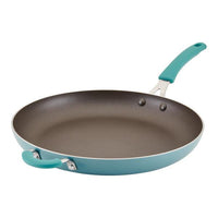 The Cook + Create Nonstick Frying Pan is a high-performance teal pan made from thicker gauge aluminum, featuring two convenient handles.