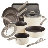 Explore the ideal Cook + Create Nonstick Cookware Sets, including an assortment of pans, pots, lids, a baking tray, and a spatula. Each piece is crafted for durability and convenience, featuring oven-safe capabilities and scratch-resistant surfaces to guarantee enduring performance in your culinary endeavors.