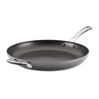 The Cook + Create Hard Anodized Nonstick Frying Pan is made from durable hard-anodized aluminum and comes with a long handle as well as an additional side handle. It features a triple-layer nonstick coating, ensuring easy cooking and cleaning.
