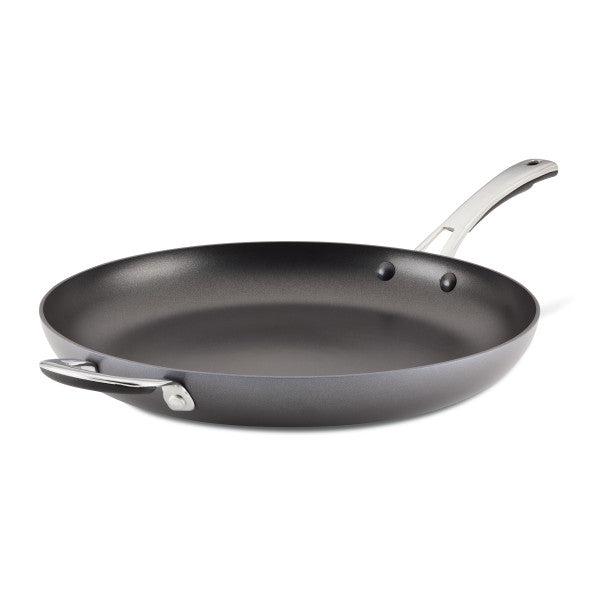 The Cook + Create Hard Anodized Nonstick Frying Pan is made from durable hard-anodized aluminum and comes with a long handle as well as an additional side handle. It features a triple-layer nonstick coating, ensuring easy cooking and cleaning.