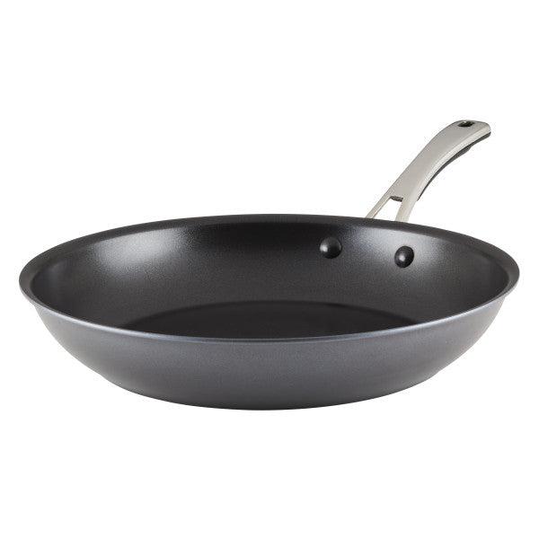 Discover the Cook + Create Hard Anodized Nonstick Frying Pans, boasting a triple-layer nonstick surface and a sleek stainless steel handle. Crafted from hard-anodized aluminum, they ensure even heat distribution for perfect cooking every time.