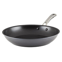 Discover the Cook + Create Hard Anodized Nonstick Frying Pans, boasting a triple-layer nonstick surface and a sleek stainless steel handle. Crafted from hard-anodized aluminum, they ensure even heat distribution for perfect cooking every time.
