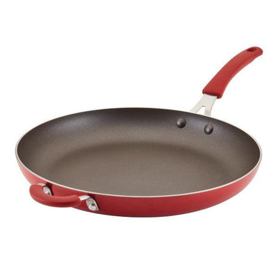 A red non-stick frying pan with a long handle.