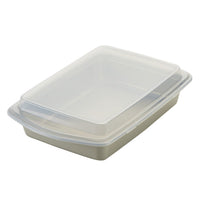 A clear, rectangular plastic storage container with a lid, ideal for organizing your 10-Piece Nonstick Bakeware Set.
