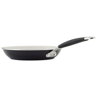 10-Piece Ceramic Nonstick Cookware Set with white interiors and black handles.