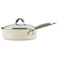 Ceramic Nonstick Saute Pan with glass lid and gray handle, cream color side view.