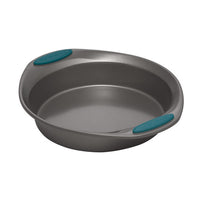 The 5-Piece Nonstick Bakeware Set includes a gray round baking pan featuring teal silicone grips on the handles, made from heavy gauge steel. Oven safe up to 500°F, this bakeware set guarantees effortless food release and easy cleanup.