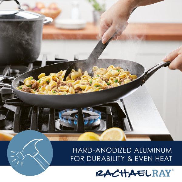 Cooking pasta in the Cook + Create Hard Anodized Nonstick Frying Pan on a stovetop, with steam rising gracefully.