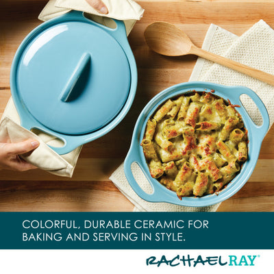 Blue ceramic bakeware with pasta dish and lid, accompanied by a wooden spoon.