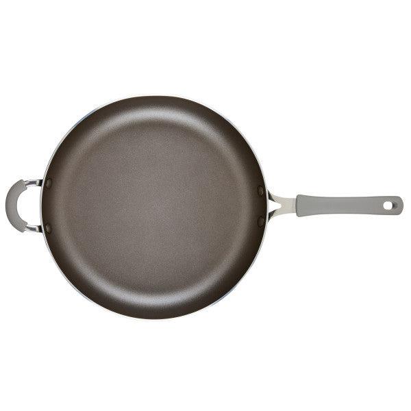 Cook + Create Nonstick Frying Pan, featuring a high-performance nonstick surface and a gray handle, crafted from thicker gauge aluminum and viewed from above.