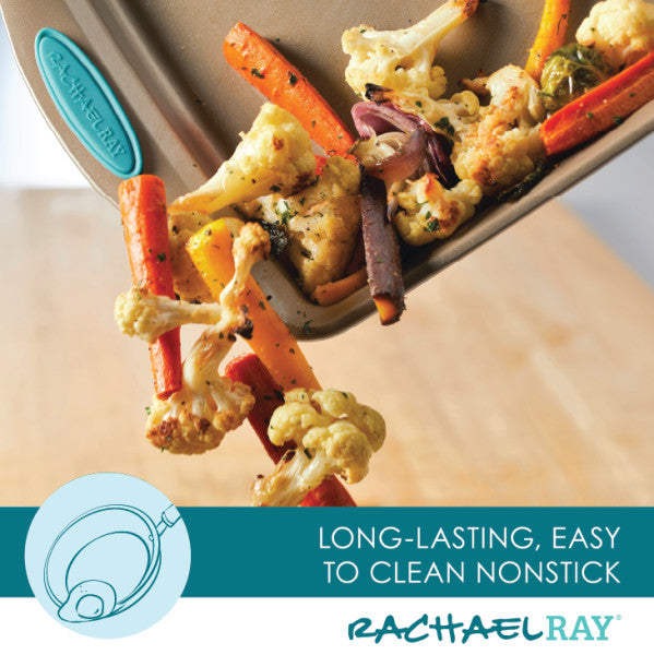 Roasted vegetables being poured out from the oven-safe, nonstick 4-Piece Bakeware Set with the Rachael Ray label visible.