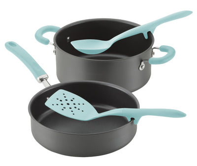 Two nonstick pans with teal handles and matching kitchen utensils.