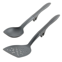 Introducing the 2-Piece Lazy Scraping Spoon and Turner in gray, tailored for culinary convenience. This set includes a versatile spoon and a slotted spatula, both designed to withstand high heat, making them ideal for any cooking endeavor. With the innovative lazy tool notch feature, they effortlessly rest on the pot's edge, helping to maintain an organized kitchen.