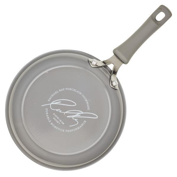 Cook + Create Nonstick Frying Pans with a thicker gauge aluminum base and ergonomic handle, viewed from the bottom.